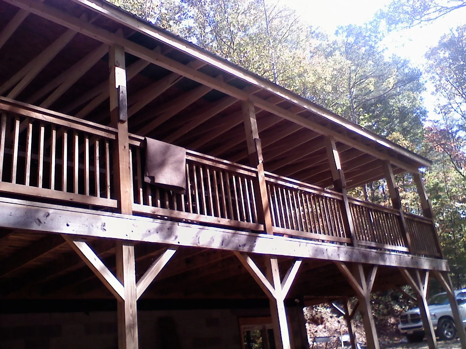 Timber framing under a new elevated porch and deck — Roof Leak Repair in Stone Mountain by Roofing Brothers